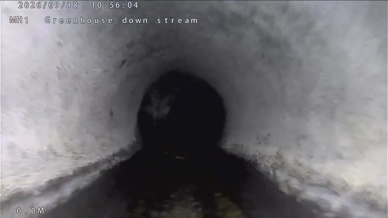 CCTV still looking downstream inside a domestic drain pipe