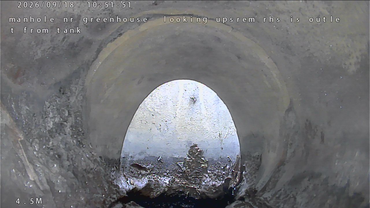 CCTV still showing septic tank outlet entering the drain line