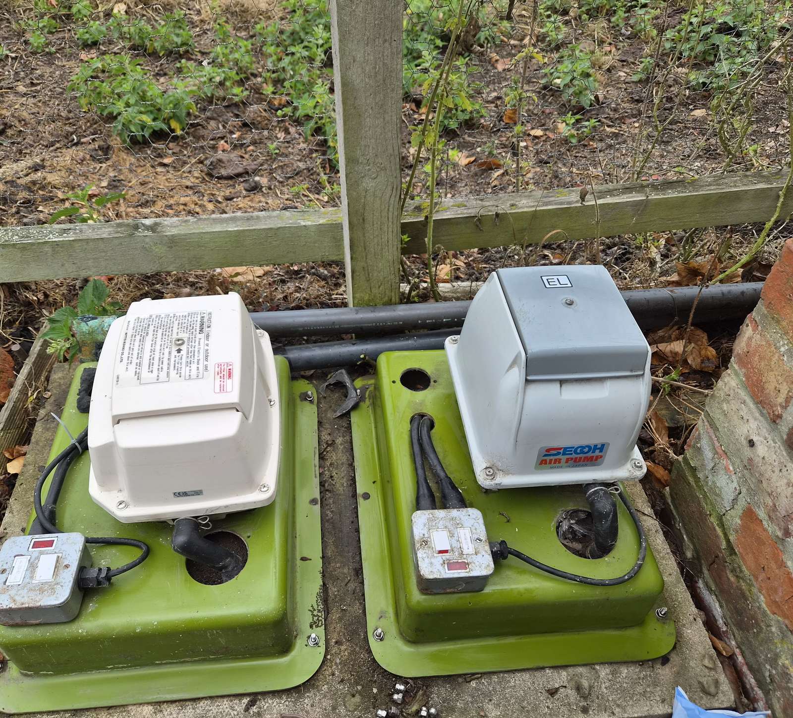 Finished treatment plant with air pumps fitted on green lids